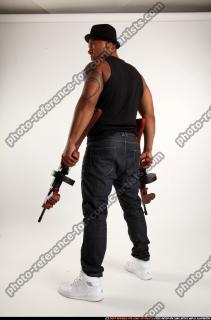 Ron-tommyguns-pose3