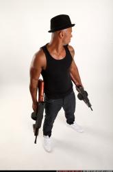 Ron-tommyguns-pose3