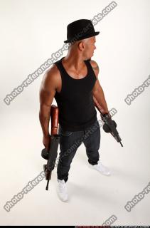 Ron-tommyguns-pose3