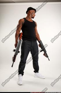 Ron-tommyguns-pose3