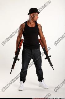 Ron-tommyguns-pose3