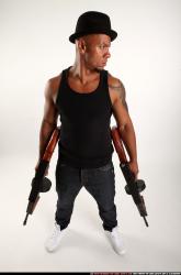 Ron-tommyguns-pose3