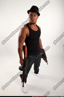 Ron-tommyguns-pose3