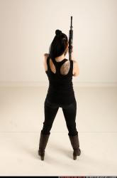 claudia-standing-m4a1-pose
