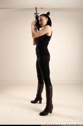 claudia-standing-m4a1-pose