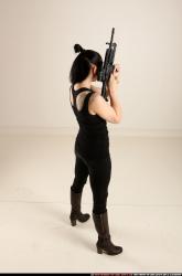 claudia-standing-m4a1-pose