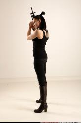 claudia-standing-m4a1-pose