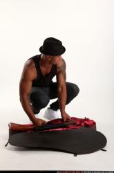 Ron-tommygun-case-various-poses