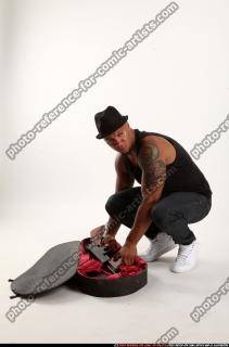 2017 03 RON TOMMYGUN CASE VARIOUS POSES 02