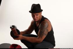 Ron-tommygun-case-various-poses