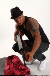 Ron-tommygun-case-various-poses