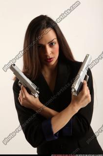Jade-crossed-pistols-pose