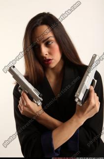 Jade-crossed-pistols-pose