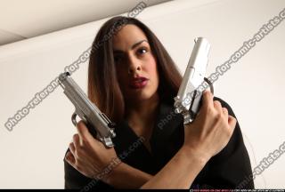 Jade-crossed-pistols-pose