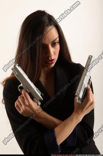 Jade-crossed-pistols-pose