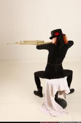 victoria-steampunk-sitting-aiming-rifle