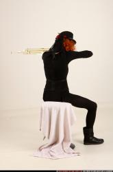 victoria-steampunk-sitting-aiming-rifle