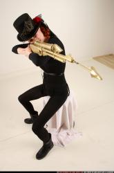 victoria-steampunk-sitting-aiming-rifle