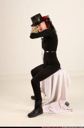 victoria-steampunk-sitting-aiming-rifle