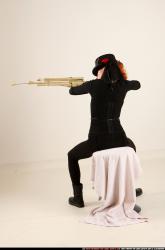 victoria-steampunk-sitting-aiming-rifle