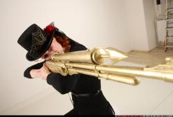 victoria-steampunk-sitting-aiming-rifle