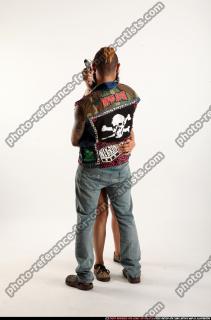 Edgar-pistols-pose4-cross-shooting