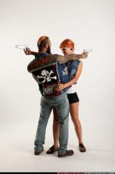 Edgar-pistols-pose4-cross-shooting