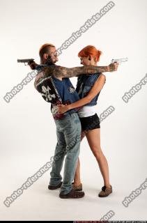 Edgar-pistols-pose4-cross-shooting