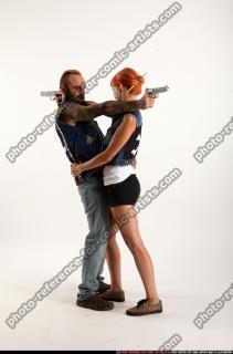 Edgar-pistols-pose4-cross-shooting