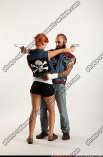 Edgar-pistols-pose4-cross-shooting