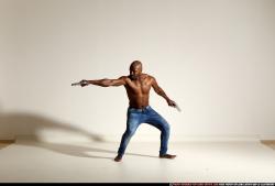 Man Adult Athletic Black Fighting with gun Moving poses Pants