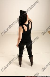 claudia-standing-aiming-pistol 