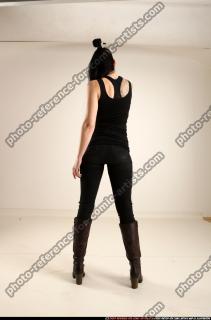claudia-standing-aiming-pistol 