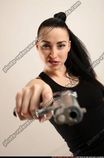 claudia-standing-aiming-pistol 