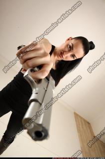 claudia-standing-aiming-pistol 