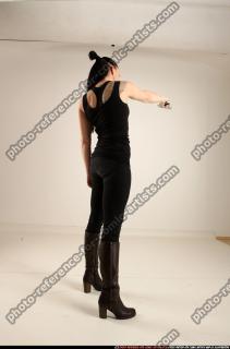 claudia-standing-aiming-pistol 