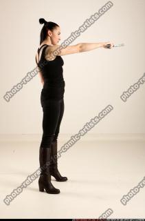 claudia-standing-aiming-pistol 