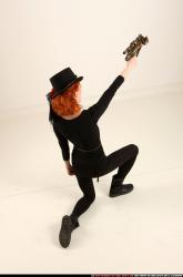 victoria-steampunk-kneeling-crossbow-pistols-aiming