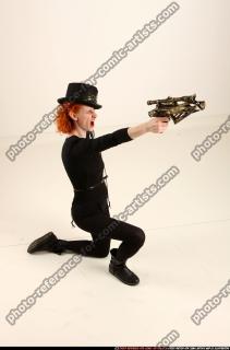 victoria-steampunk-kneeling-crossbow-pistols-aiming