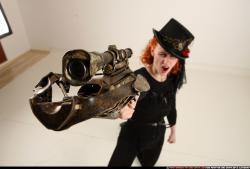 victoria-steampunk-kneeling-crossbow-pistols-aiming