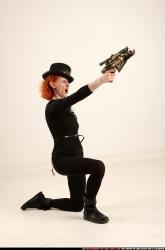 victoria-steampunk-kneeling-crossbow-pistols-aiming