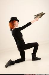 victoria-steampunk-kneeling-crossbow-pistols-aiming