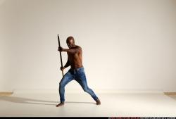 smax-eduardo-stick-attack-pose2