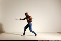 smax-eduardo-stick-attack-pose2