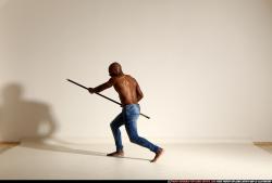 smax-eduardo-stick-attack-pose2