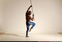 smax-eduardo-stick-attack-pose2