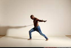 smax-eduardo-stick-attack-pose3