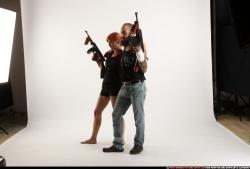 COUPLES5-TOMMYGUNS-NEUTRAL-POSE