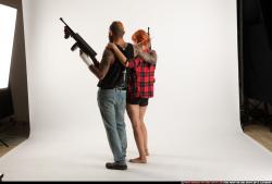 COUPLES5-TOMMYGUNS-NEUTRAL-POSE