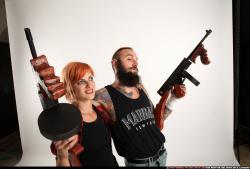 COUPLES5-TOMMYGUNS-NEUTRAL-POSE